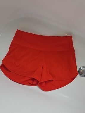 Lululemon Orange Active Split Hem Shorts
